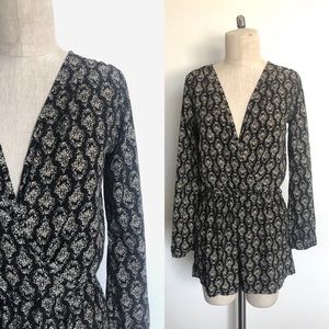 BLACK FLORAL PRINT LONG SLEEVED ROMPER - S/M